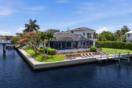 Corner-lot waterfront retreat with private dock and tropical grounds at Tigertail Beach Villa, Marco Island FL