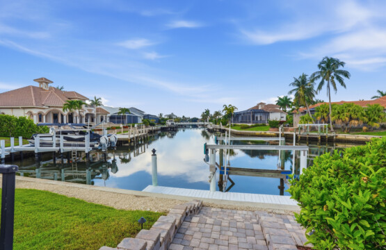 Private dock with peaceful canal views and luxury waterfront surroundings at Tigertail Beach Villa, Marco Island FL